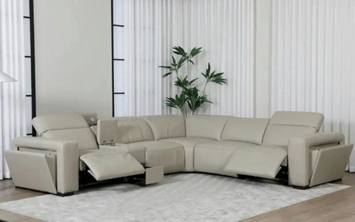 A beige sectional sofa set in Ahmedabad